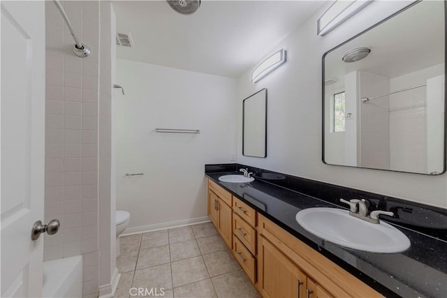 4200 Via Arbolada Unit 123, Los Angeles, CA 90042 - bathroom with double vanity, toilet, tile patterned floors, tub / shower combination, and baseboards