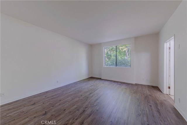 4200 Via Arbolada Unit 123, Los Angeles, CA 90042 - empty room with wood finished floors and baseboards