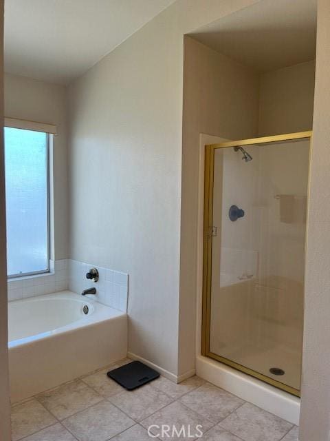 3060 Summer Set Cir, Banning, CA 92220 - full bathroom featuring a shower stall, tile patterned floors, a bath, and baseboards