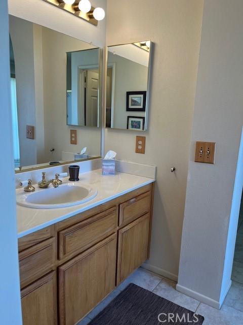 3060 Summer Set Cir, Banning, CA 92220 - bathroom featuring vanity and tile patterned flooring