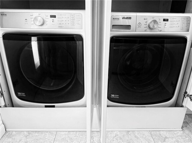 laundry room with washer / clothes dryer
