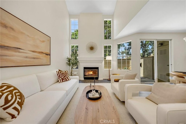 13385 Savanna, Tustin, CA 92782 - living area featuring a towering ceiling and a glass covered fireplace