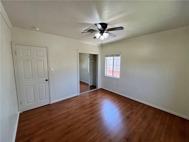 136 S Fircroft St, West Covina, CA 91791 - unfurnished bedroom with baseboards, dark wood-style floors, a closet, crown molding, and ceiling fan