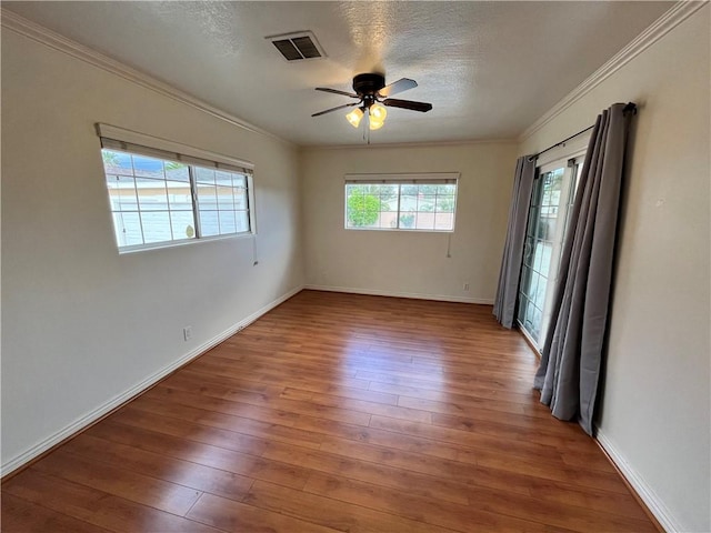 136 S Fircroft St, West Covina, CA 91791 - unfurnished room featuring ornamental molding, hardwood / wood-style floors, ceiling fan, baseboards, and a textured ceiling