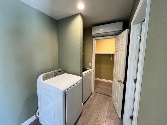 136 S Fircroft St, West Covina, CA 91791 - laundry room featuring a wall mounted air conditioner, baseboards, light wood-style flooring, separate washer and dryer, and recessed lighting