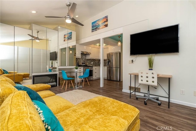17072 Pacific Coast Unit 202, Huntington Beach, CA 92649 - living area featuring wood finished floors, ceiling fan, baseboards, and recessed lighting