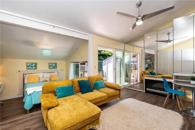 17072 Pacific Coast Unit 202, Huntington Beach, CA 92649 - bedroom with vaulted ceiling, wood finished floors, access to outside, a ceiling fan, and baseboards