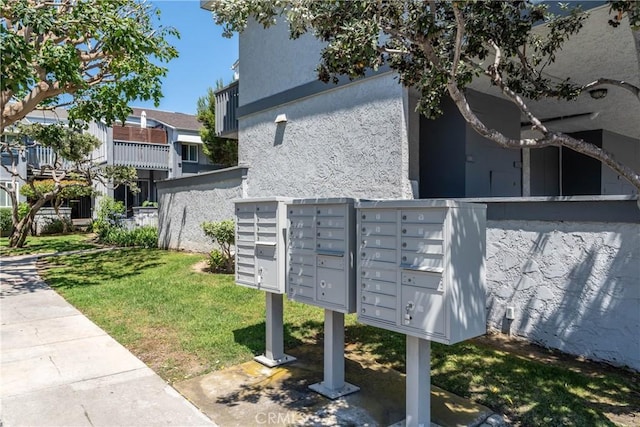 17072 Pacific Coast Unit 202, Huntington Beach, CA 92649 - view of property's community with mail area and a lawn