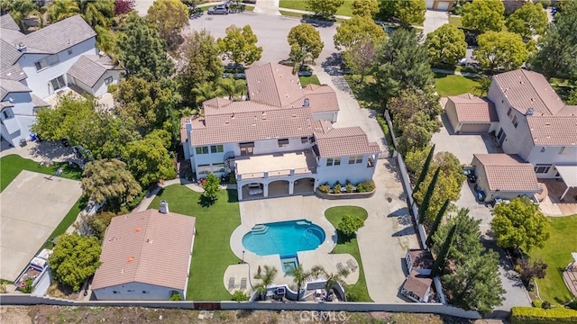 aerial perspective of suburban area with a pool