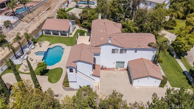 view from above of property with a pool area