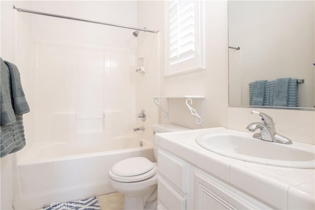 full bathroom featuring toilet, bathtub / shower combination, and vanity