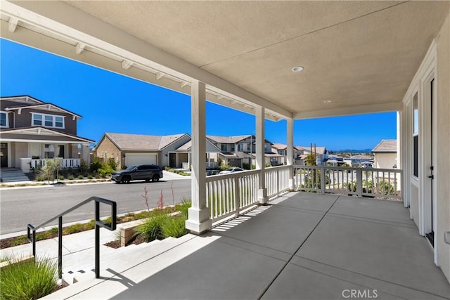 view of patio / terrace with a residential view