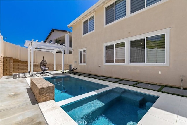 view of swimming pool with a pergola, fence, a patio area, central air condition unit, and a pool with connected hot tub
