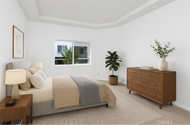 4230 Colfax Ave Unit 103, Studio City, CA 91604 - bedroom with light colored carpet, a tray ceiling, and baseboards