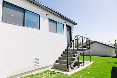 606608 Fairview Ave, Los Angeles, CA 90033 - exterior space featuring stucco siding and a lawn