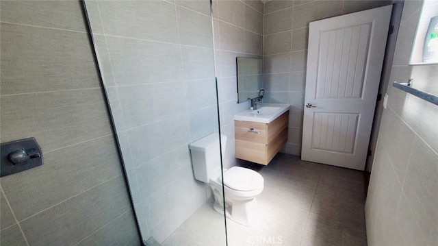 606608 Fairview Ave, Los Angeles, CA 90033 - bathroom featuring tile walls, vanity, and toilet