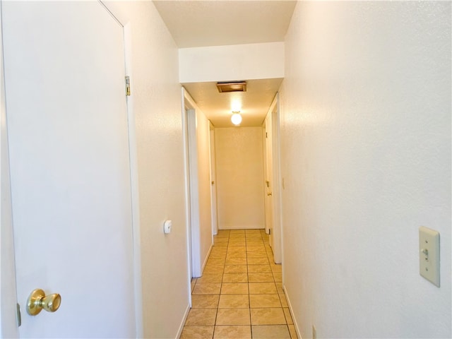 933 Campbell Ave, Yreka, CA 96064 - corridor featuring light tile patterned floors and baseboards