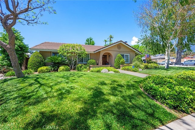 9170 Old Ranch Rd, Rancho Cucamonga, CA 91701 - single story home with stucco siding and a front yard