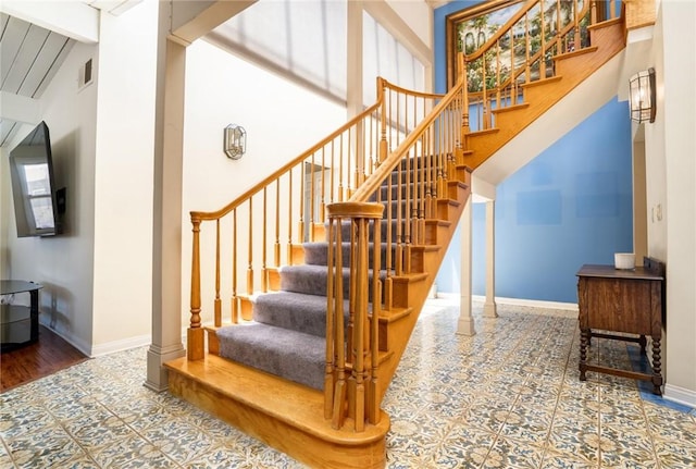 321 13th St, Huntington Beach, CA 92648 - stairs featuring baseboards and tile patterned floors