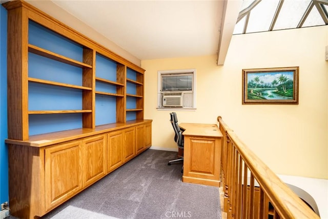 321 13th St, Huntington Beach, CA 92648 - unfurnished office featuring dark colored carpet, cooling unit, built in desk, and baseboards