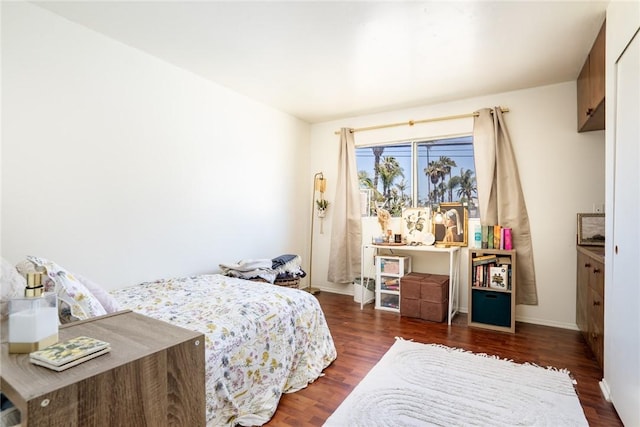 321 13th St, Huntington Beach, CA 92648 - bedroom featuring dark wood-type flooring and baseboards