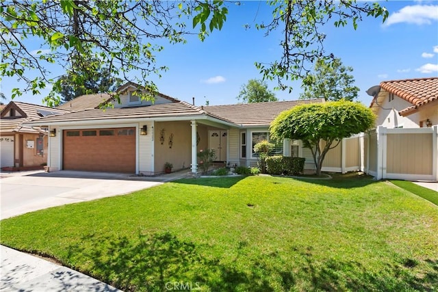 ranch-style house with a garage, a tiled roof, and concrete driveway