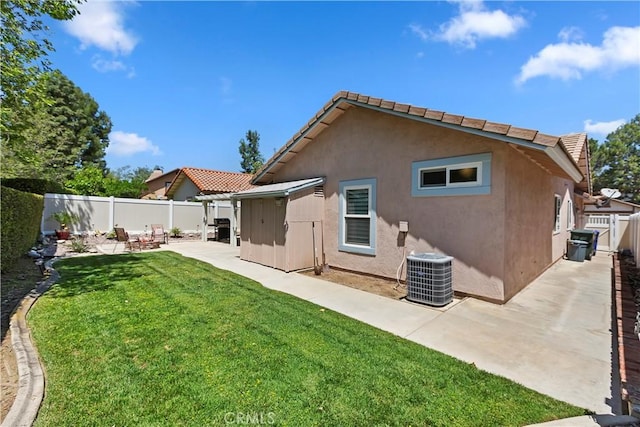 rear view of house featuring central AC unit, a patio, stucco siding, and a tiled roof