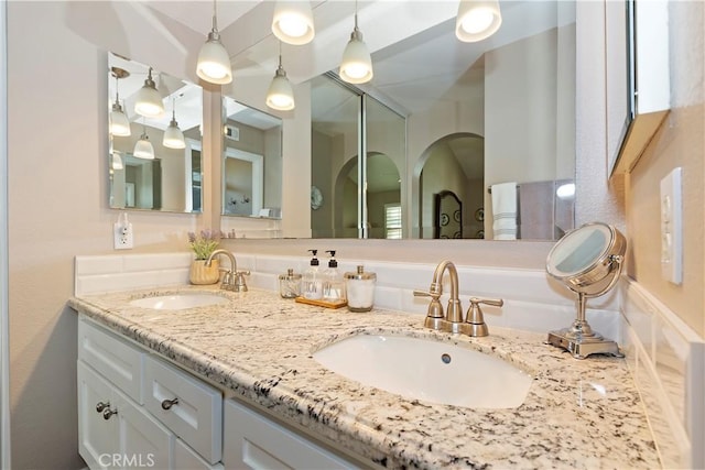 full bathroom with double vanity