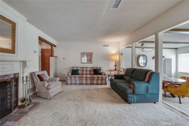 404 N San Jose Ave, Covina, CA 91723 - living room featuring a premium fireplace, carpet, and a textured ceiling