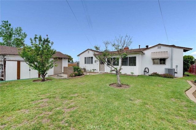 404 N San Jose Ave, Covina, CA 91723 - back of property with an outdoor structure, stucco siding, and central AC