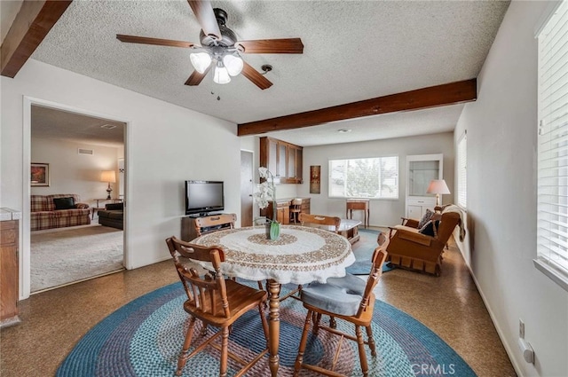 404 N San Jose Ave, Covina, CA 91723 - dining area featuring beamed ceiling, a textured ceiling, a ceiling fan, and baseboards