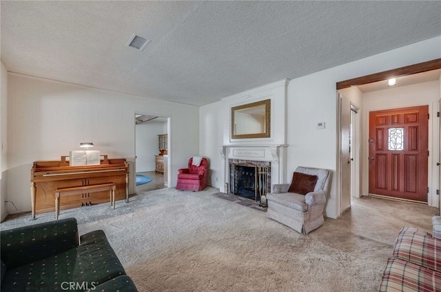 404 N San Jose Ave, Covina, CA 91723 - carpeted living room featuring a fireplace with flush hearth and a textured ceiling