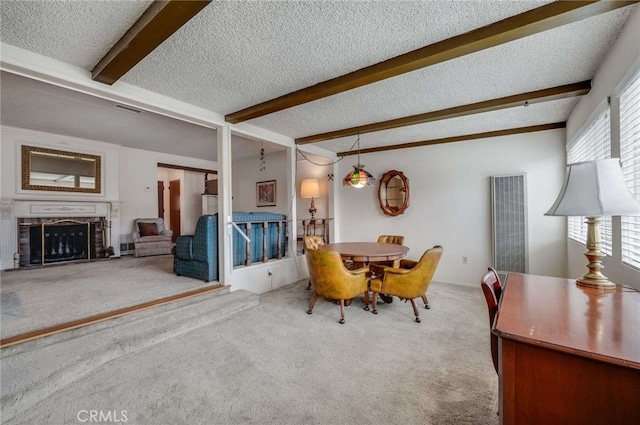 404 N San Jose Ave, Covina, CA 91723 - dining space with carpet flooring, beam ceiling, healthy amount of natural light, a heating unit, and a textured ceiling