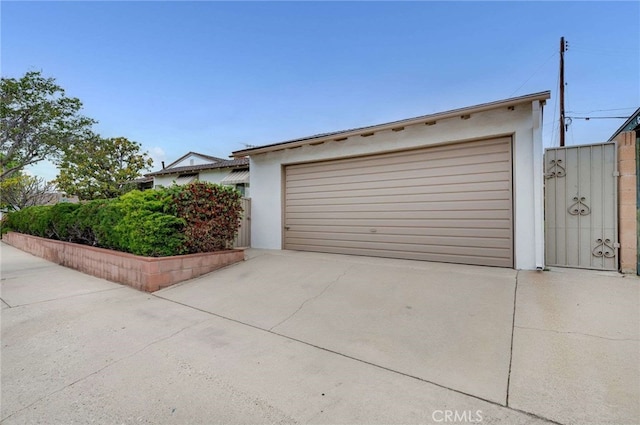 404 N San Jose Ave, Covina, CA 91723 - detached garage featuring concrete driveway