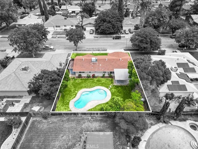 3439 De Anza Ave, Merced, CA 95348 - aerial perspective of suburban area featuring a pool area and property parcel outlined
