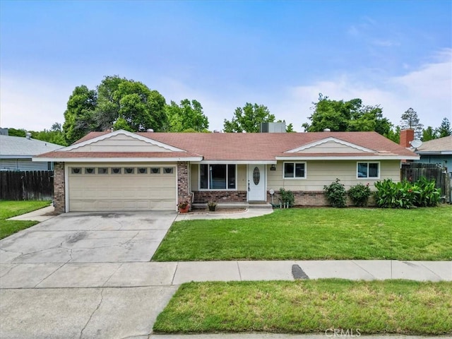 3439 De Anza Ave, Merced, CA 95348 - ranch-style house with a garage, concrete driveway, and brick siding
