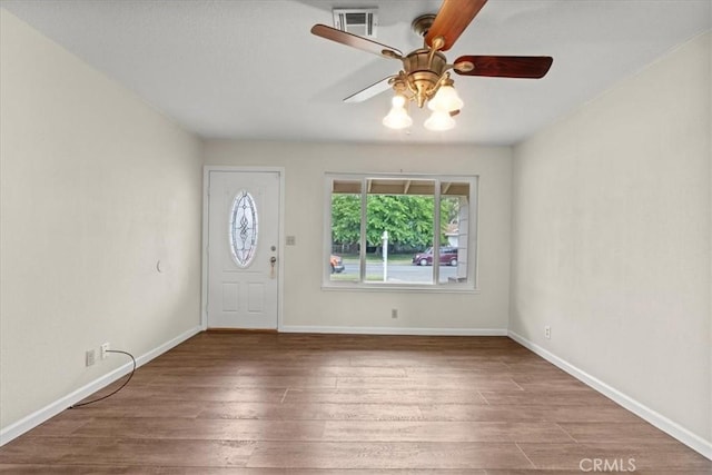 3439 De Anza Ave, Merced, CA 95348 - entrance foyer featuring ceiling fan, wood finished floors, and baseboards