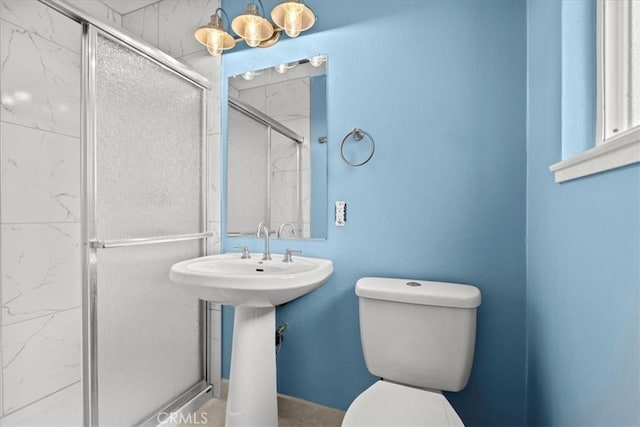3439 De Anza Ave, Merced, CA 95348 - bathroom with a marble finish shower and toilet