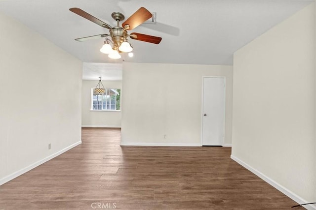 3439 De Anza Ave, Merced, CA 95348 - spare room with wood finished floors, ceiling fan, and baseboards