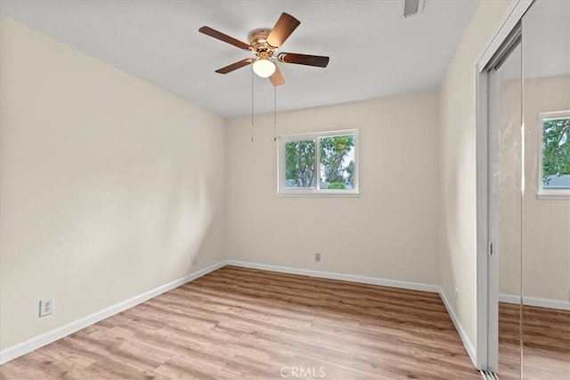 3439 De Anza Ave, Merced, CA 95348 - spare room with plenty of natural light, a ceiling fan, light wood-style flooring, and baseboards
