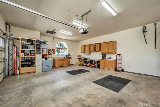21425 Valley Oak Dr, Middletown, CA 95461 - garage featuring a garage door opener
