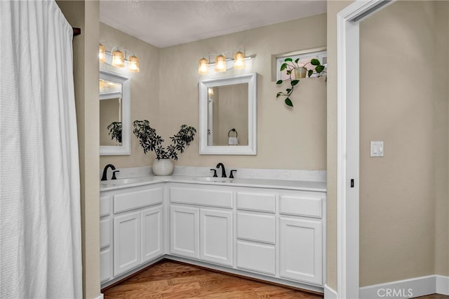 21425 Valley Oak Dr, Middletown, CA 95461 - bathroom with wood finished floors and double vanity