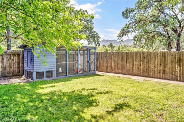 21425 Valley Oak Dr, Middletown, CA 95461 - view of yard with exterior structure, an outdoor structure, and a mountain view