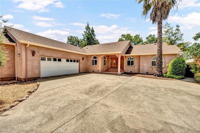 21425 Valley Oak Dr, Middletown, CA 95461 - ranch-style home featuring driveway, a garage, stucco siding, and crawl space