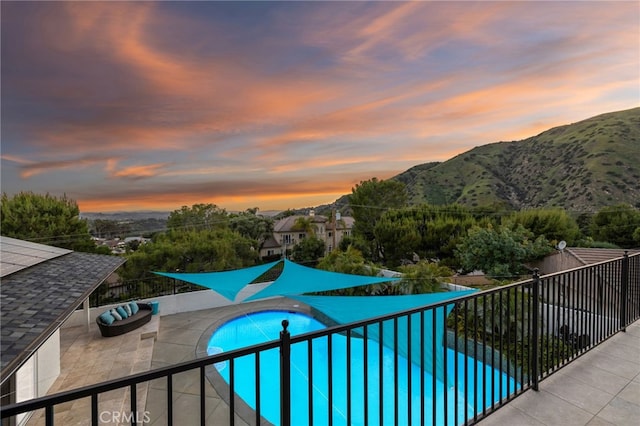 5150 Mountain Springs Ranch Rd, La Verne, CA 91750 - view of swimming pool featuring a mountain view, a patio area, and fence