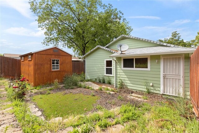 2981 Elgin St, Oroville, CA 95966 - view of property exterior featuring fence and an outbuilding