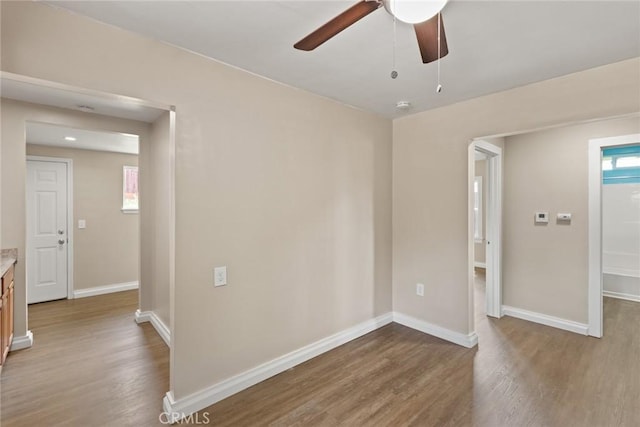 2981 Elgin St, Oroville, CA 95966 - empty room with wood finished floors, baseboards, and ceiling fan