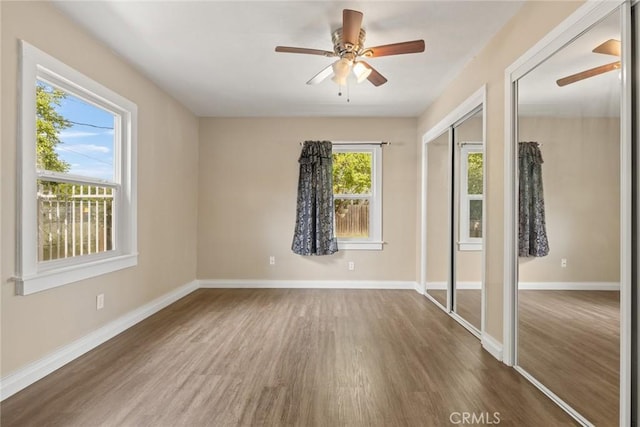 2981 Elgin St, Oroville, CA 95966 - unfurnished room featuring wood finished floors, baseboards, and a ceiling fan