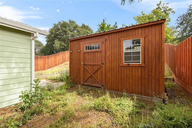 2981 Elgin St, Oroville, CA 95966 - view of shed featuring a fenced backyard
