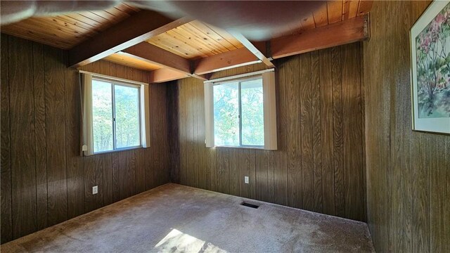 25 Manzanita, Running Springs, CA 92382 - empty room with wood walls, carpet, wooden ceiling, and beam ceiling